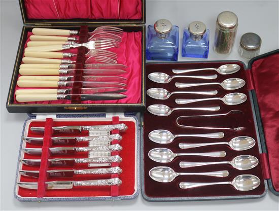 Three cased silver cutlery sets and two scent bottles